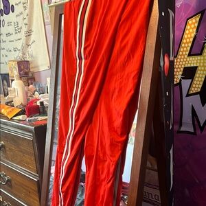 Red Track Pants with White Stripes